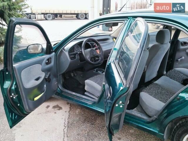 Дэу Ланос 2007 в Днепре (Днепропетровске) на Automoto.ua Зеленый Дэу Ланос, объемом двигателя 1.4 л и пробегом 98 тыс. км за 2799 $, фото 13 на Automoto.ua