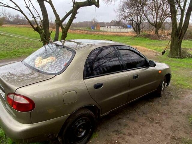 Зеленый Дэу Ланос, объемом двигателя 1.4 л и пробегом 232 тыс. км за 800 $, фото 6 на Automoto.ua