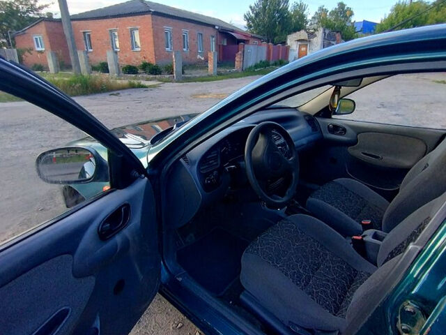 Зелений Деу Ланос, об'ємом двигуна 1.4 л та пробігом 0 тис. км за 1600 $, фото 6 на Automoto.ua