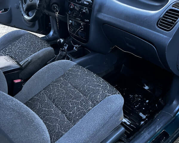 Зелений Деу Ланос, об'ємом двигуна 1.5 л та пробігом 253 тис. км за 2500 $, фото 9 на Automoto.ua