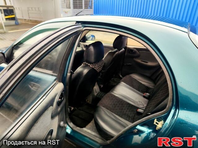 Зеленый Дэу Ланос, объемом двигателя 1.5 л и пробегом 283 тыс. км за 2200 $, фото 9 на Automoto.ua