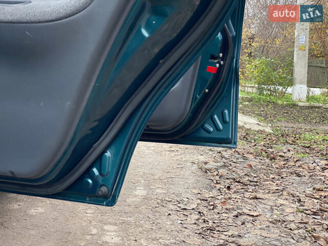 Зеленый Дэу Ланос, объемом двигателя 1.5 л и пробегом 135 тыс. км за 2800 $, фото 12 на Automoto.ua