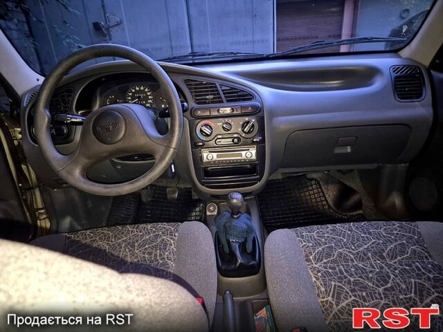 Зеленый Дэу Ланос, объемом двигателя 1.4 л и пробегом 47 тыс. км за 2800 $, фото 9 на Automoto.ua