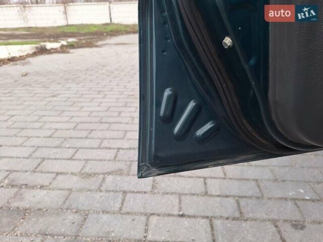 Зеленый Дэу Ланос, объемом двигателя 1.5 л и пробегом 146 тыс. км за 2300 $, фото 2 на Automoto.ua