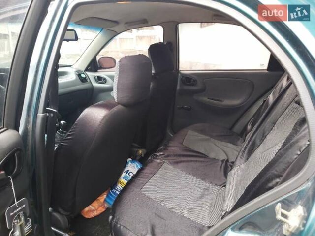 Зелений Деу Ланос, об'ємом двигуна 1.39 л та пробігом 260 тис. км за 2400 $, фото 3 на Automoto.ua