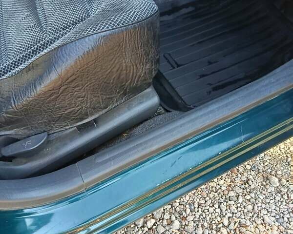 Зеленый Дэу Ланос, объемом двигателя 1.5 л и пробегом 158 тыс. км за 2800 $, фото 4 на Automoto.ua