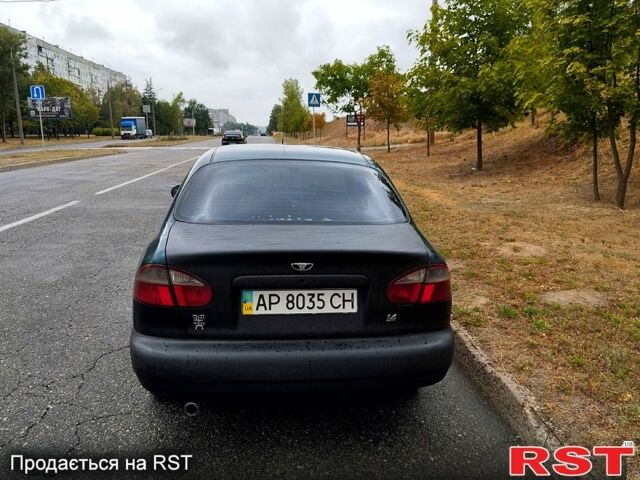 Зеленый Дэу Ланос, объемом двигателя 1.4 л и пробегом 350 тыс. км за 1300 $, фото 3 на Automoto.ua