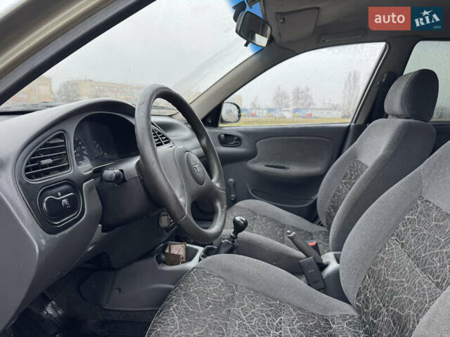 Зелений Деу Ланос, об'ємом двигуна 1.39 л та пробігом 196 тис. км за 1100 $, фото 15 на Automoto.ua