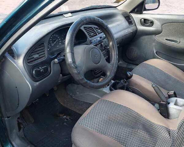 Зеленый Дэу Ланос, объемом двигателя 1.5 л и пробегом 330 тыс. км за 1300 $, фото 15 на Automoto.ua