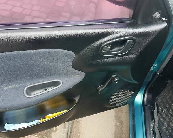 Зелений Деу Ланос, об'ємом двигуна 1.5 л та пробігом 300 тис. км за 1450 $, фото 6 на Automoto.ua