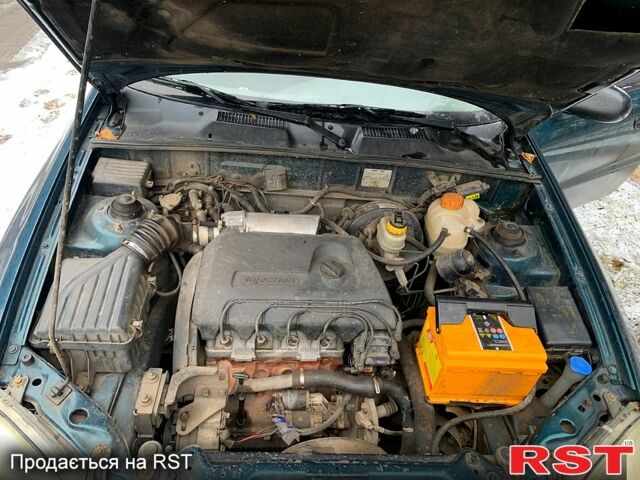 Зеленый Дэу Ланос, объемом двигателя 1.4 л и пробегом 280 тыс. км за 2000 $, фото 7 на Automoto.ua