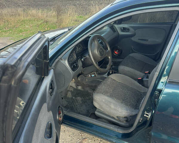 Зеленый Дэу Ланос, объемом двигателя 1.5 л и пробегом 250 тыс. км за 2800 $, фото 13 на Automoto.ua