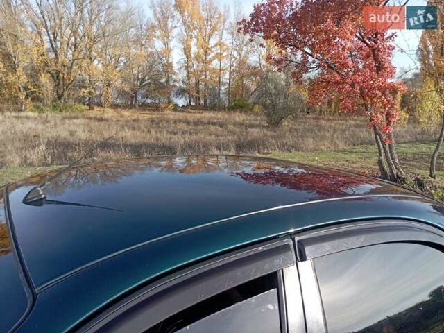 Деу Ланос 2007 у Верхнеднепровске на Automoto.ua Зелений Деу Ланос, об'ємом двигуна 1.4 л та пробігом 155 тис. км за 2999 $, фото 11 на Automoto.ua