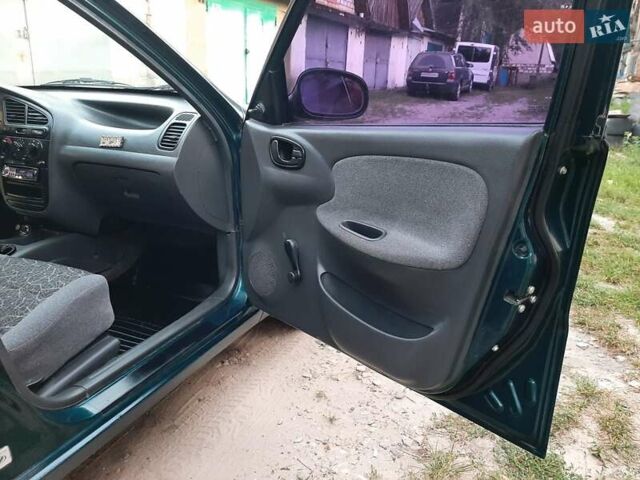 Зелений Деу Ланос, об'ємом двигуна 1.5 л та пробігом 186 тис. км за 2550 $, фото 26 на Automoto.ua