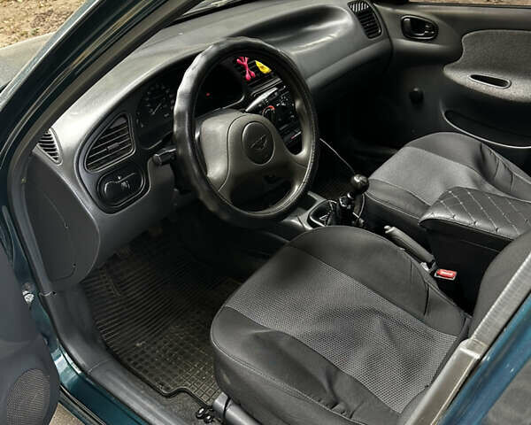 Зеленый Дэу Ланос, объемом двигателя 1.5 л и пробегом 150 тыс. км за 2600 $, фото 6 на Automoto.ua