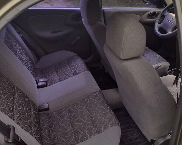 Зеленый Дэу Ланос, объемом двигателя 1.6 л и пробегом 109 тыс. км за 3400 $, фото 12 на Automoto.ua