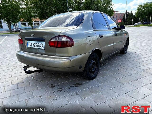 Зеленый Дэу Ланос, объемом двигателя 1.4 л и пробегом 136 тыс. км за 1400 $, фото 4 на Automoto.ua