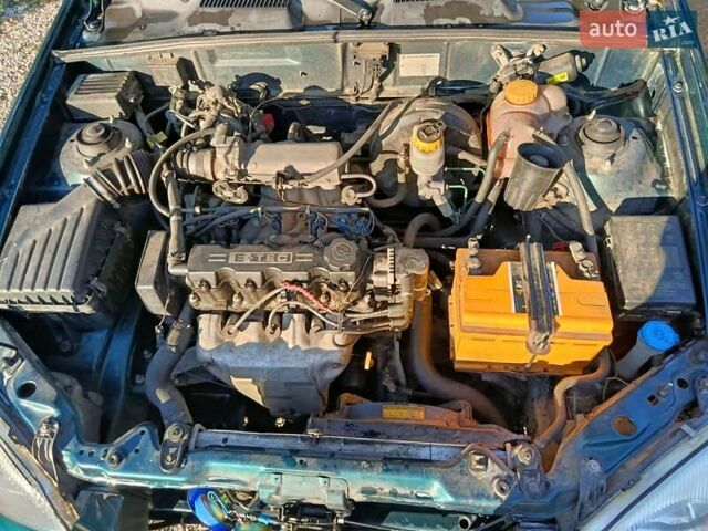 Зеленый Дэу Ланос, объемом двигателя 1.5 л и пробегом 158 тыс. км за 2800 $, фото 3 на Automoto.ua