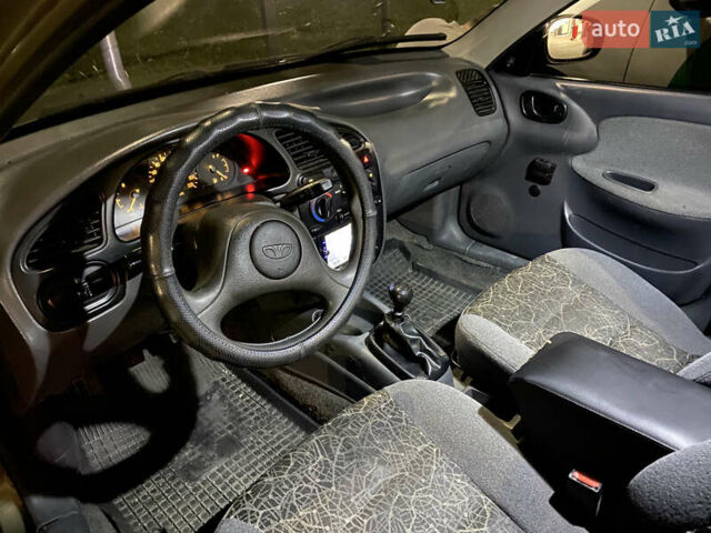 Зеленый Дэу Ланос, объемом двигателя 1.5 л и пробегом 210 тыс. км за 2000 $, фото 9 на Automoto.ua