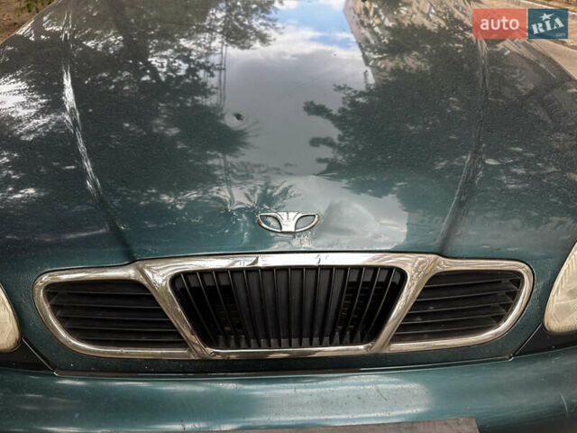 Зеленый Дэу Ланос, объемом двигателя 1.5 л и пробегом 150 тыс. км за 2600 $, фото 5 на Automoto.ua