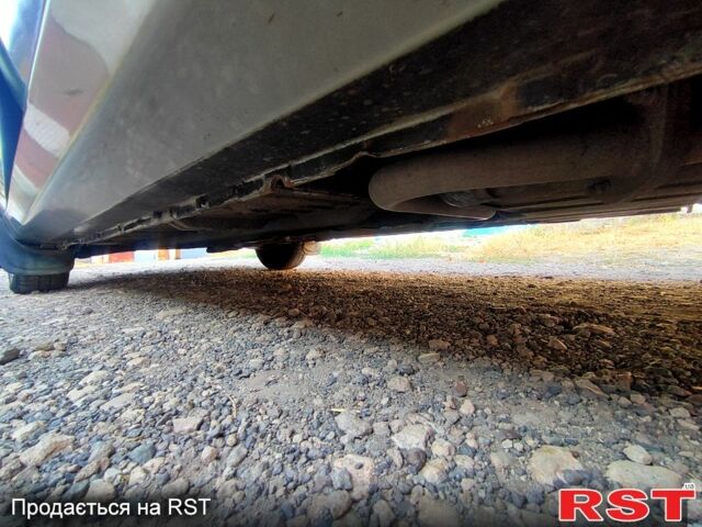 Зеленый Дэу Ланос, объемом двигателя 1.4 л и пробегом 146 тыс. км за 2200 $, фото 4 на Automoto.ua