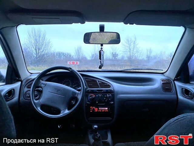 Зеленый Дэу Ланос, объемом двигателя 1.6 л и пробегом 111 тыс. км за 1500 $, фото 6 на Automoto.ua