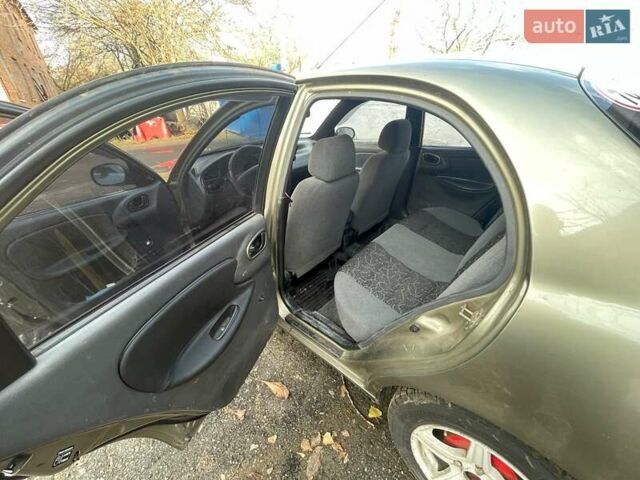 Зеленый Дэу Ланос, объемом двигателя 1.5 л и пробегом 150 тыс. км за 2500 $, фото 9 на Automoto.ua