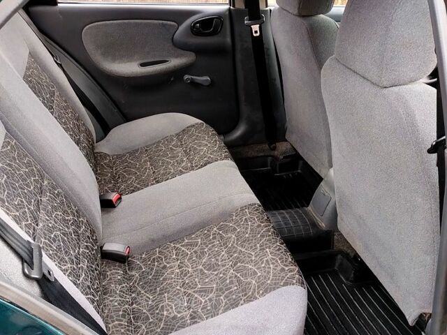 Зеленый Дэу Ланос, объемом двигателя 1.4 л и пробегом 145 тыс. км за 2050 $, фото 4 на Automoto.ua