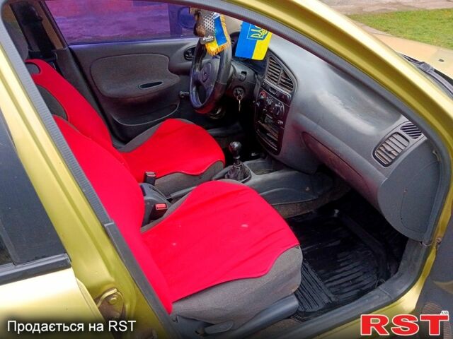 Зеленый Дэу Ланос, объемом двигателя 1.3 л и пробегом 180 тыс. км за 1300 $, фото 8 на Automoto.ua