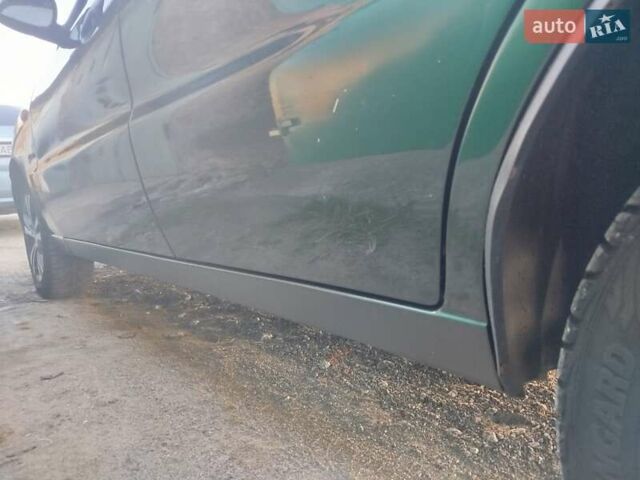 Зеленый Дэу Ланос, объемом двигателя 1.5 л и пробегом 190 тыс. км за 2700 $, фото 6 на Automoto.ua