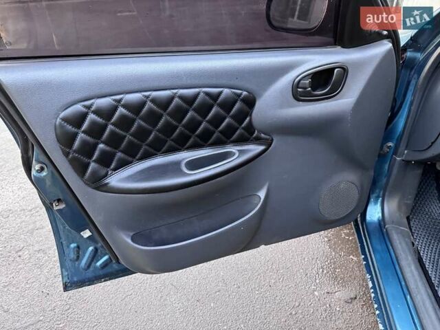 Зелений Деу Ланос, об'ємом двигуна 1.5 л та пробігом 304 тис. км за 2400 $, фото 23 на Automoto.ua