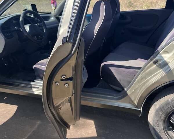 Зеленый Дэу Ланос, объемом двигателя 1.5 л и пробегом 372 тыс. км за 2500 $, фото 7 на Automoto.ua