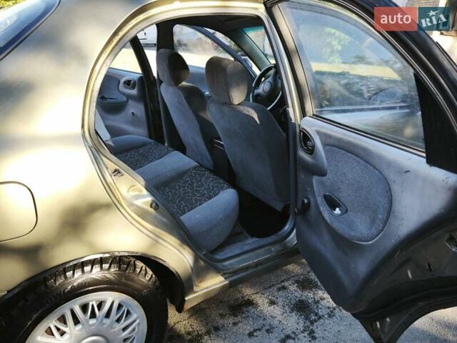 Зеленый Дэу Ланос, объемом двигателя 1.6 л и пробегом 375 тыс. км за 1800 $, фото 1 на Automoto.ua