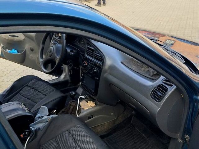 Зеленый Дэу Ланос, объемом двигателя 1.4 л и пробегом 150 тыс. км за 1800 $, фото 5 на Automoto.ua