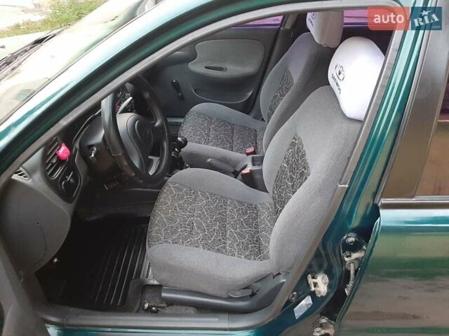 Зелений Деу Ланос, об'ємом двигуна 1.5 л та пробігом 186 тис. км за 2550 $, фото 22 на Automoto.ua