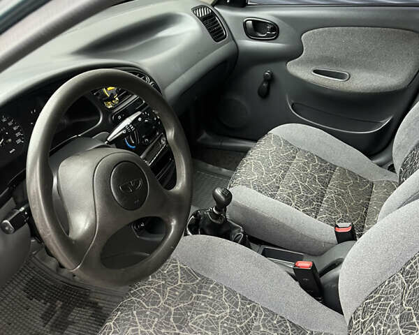 Зеленый Дэу Ланос, объемом двигателя 1.3 л и пробегом 153 тыс. км за 1500 $, фото 11 на Automoto.ua