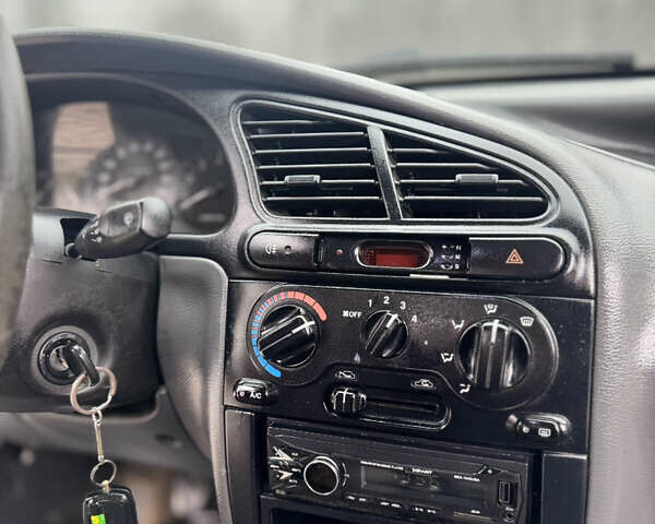 Зеленый Дэу Ланос, объемом двигателя 1.5 л и пробегом 254 тыс. км за 1900 $, фото 7 на Automoto.ua