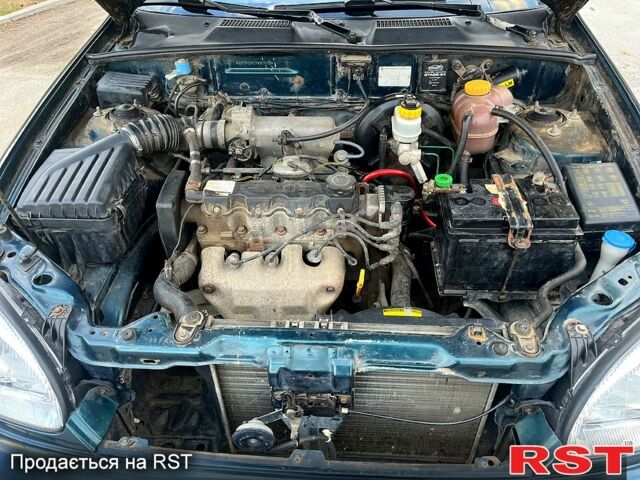 Дэу Ланос 2007 в Запорожье на Automoto.ua Зеленый Дэу Ланос, объемом двигателя 1.5 л и пробегом 154 тыс. км за 1650 $, фото 13 на Automoto.ua