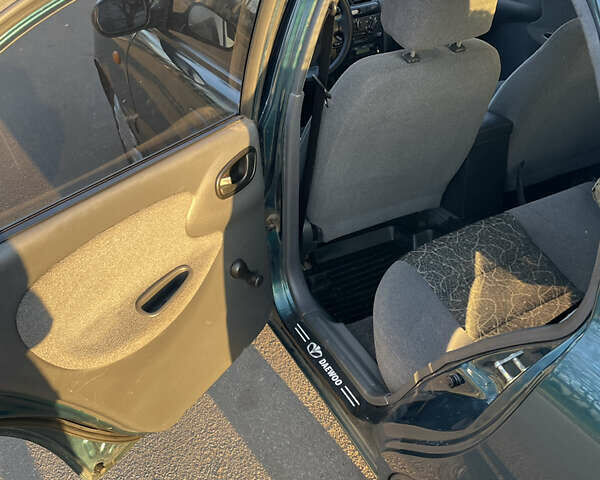 Зелений Деу Ланос, об'ємом двигуна 1.6 л та пробігом 386 тис. км за 2600 $, фото 9 на Automoto.ua