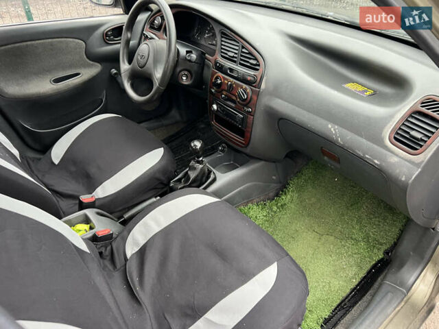 Зеленый Дэу Ланос, объемом двигателя 1.5 л и пробегом 250 тыс. км за 1600 $, фото 5 на Automoto.ua