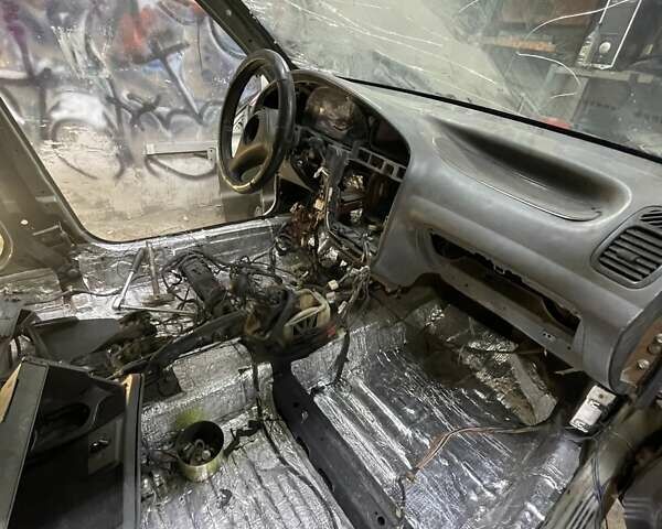 Зеленый Дэу Ланос, объемом двигателя 1.5 л и пробегом 353 тыс. км за 800 $, фото 1 на Automoto.ua