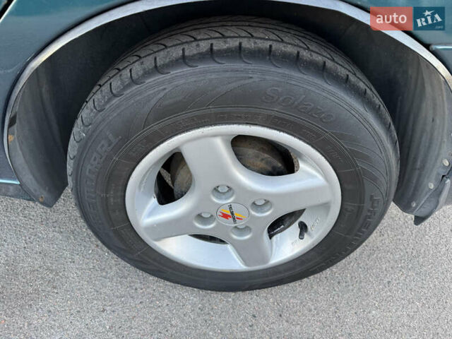 Зеленый Дэу Ланос, объемом двигателя 1.5 л и пробегом 162 тыс. км за 2500 $, фото 6 на Automoto.ua
