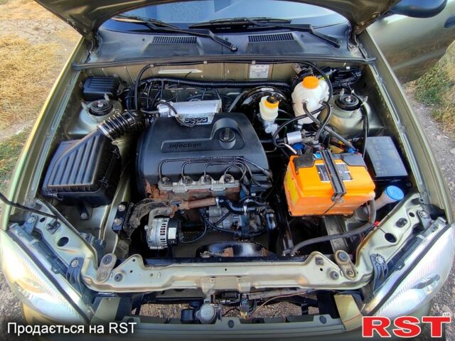 Зеленый Дэу Ланос, объемом двигателя 1.4 л и пробегом 146 тыс. км за 2200 $, фото 6 на Automoto.ua