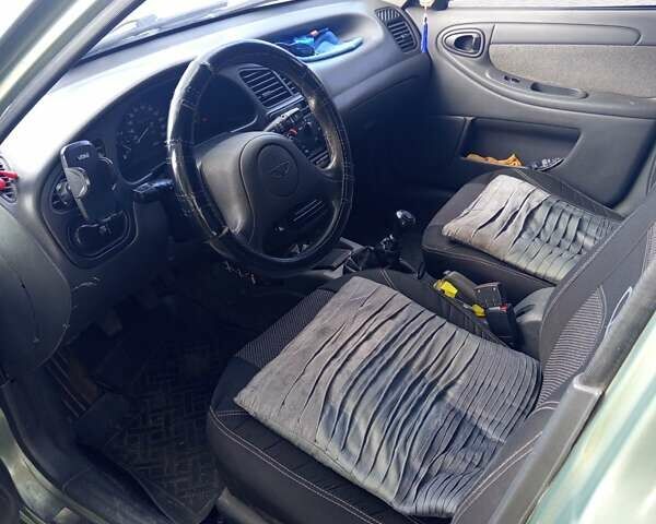 Дэу Ланос 2008 в Трускавце на Automoto.ua Зеленый Дэу Ланос, объемом двигателя 1.5 л и пробегом 232 тыс. км за 3200 $, фото 6 на Automoto.ua