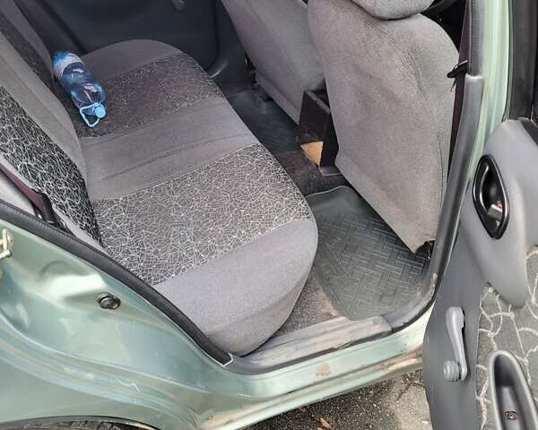 Зеленый Дэу Ланос, объемом двигателя 1.5 л и пробегом 171 тыс. км за 2300 $, фото 10 на Automoto.ua