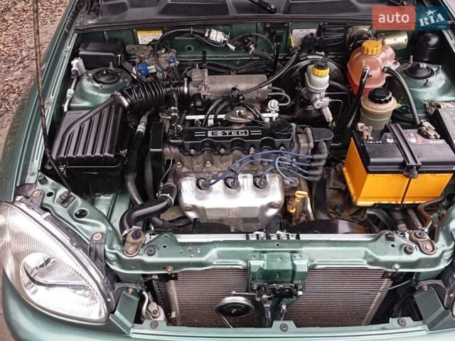 Зеленый Дэу Ланос, объемом двигателя 1.5 л и пробегом 123 тыс. км за 2755 $, фото 14 на Automoto.ua