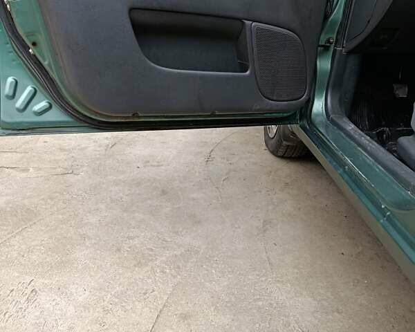 Зеленый Дэу Ланос, объемом двигателя 1.5 л и пробегом 241 тыс. км за 3000 $, фото 8 на Automoto.ua