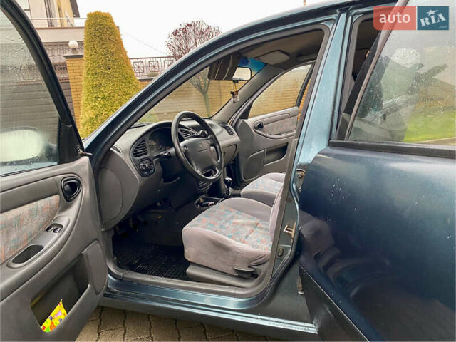 Зеленый Дэу Ланос, объемом двигателя 1.5 л и пробегом 230 тыс. км за 2400 $, фото 5 на Automoto.ua