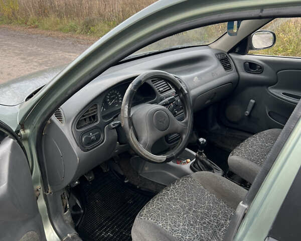 Зеленый Дэу Ланос, объемом двигателя 1.5 л и пробегом 220 тыс. км за 1850 $, фото 6 на Automoto.ua