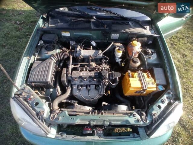 Зеленый Дэу Ланос, объемом двигателя 1.5 л и пробегом 211 тыс. км за 2400 $, фото 4 на Automoto.ua